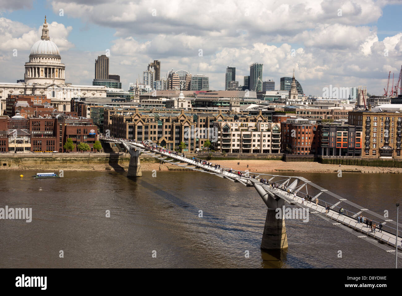 Millennium bridge over the river Thames in London Stock Photo