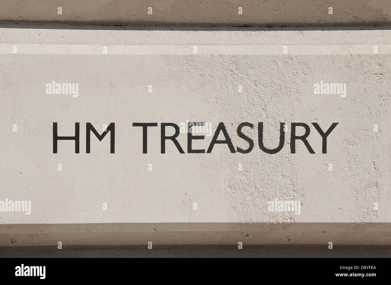 HM Treasury printed on the wall outside the HM Treasury entrance on Horse Guards Road, London, UK. Stock Photo
