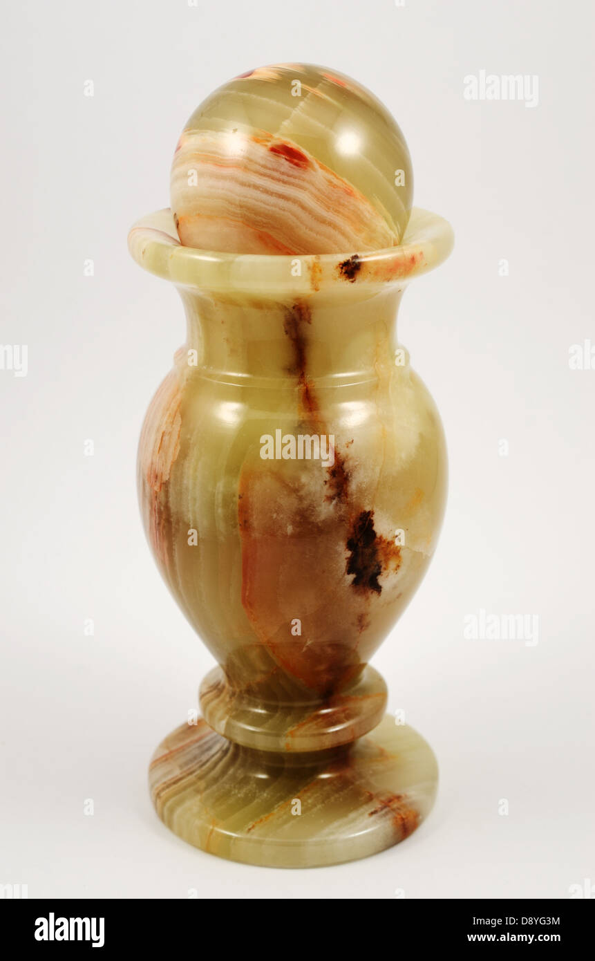 small carved jade vase on a white background Stock Photo Alamy