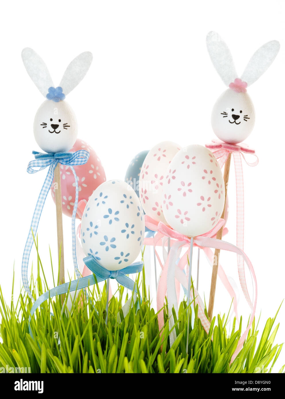Easter eggs and bunnies in grass Stock Photo - Alamy