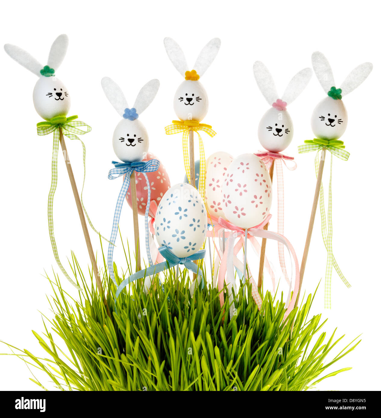 Easter eggs and bunnies in grass Stock Photo - Alamy