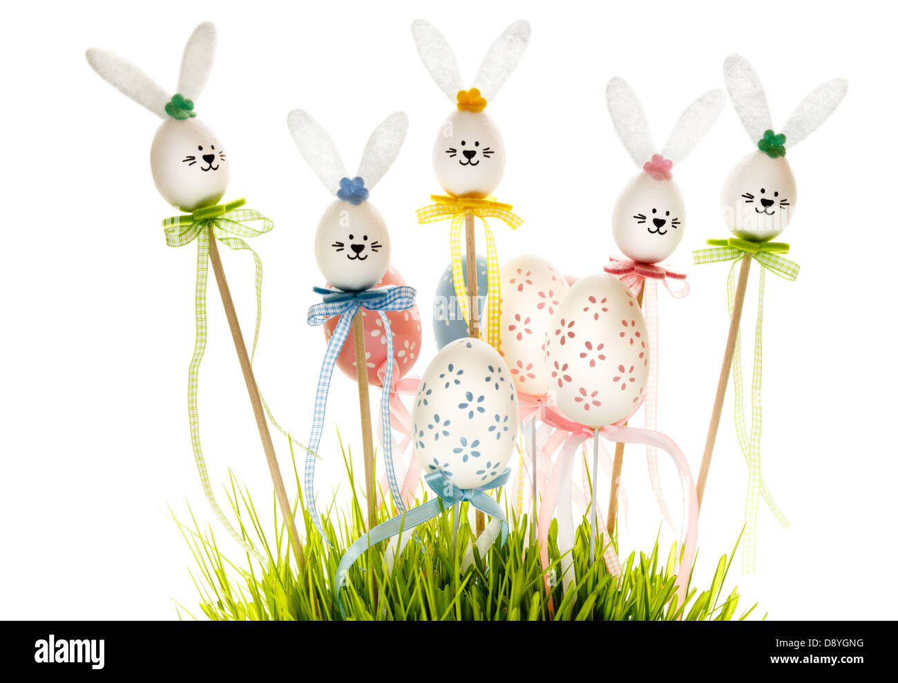 Easter eggs and bunnies in grass Stock Photo