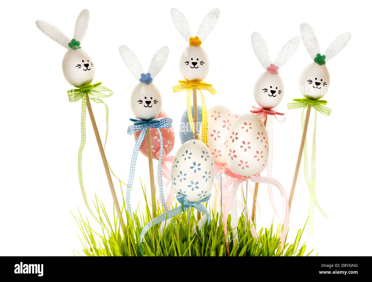 Easter eggs and bunnies in grass Stock Photo - Alamy