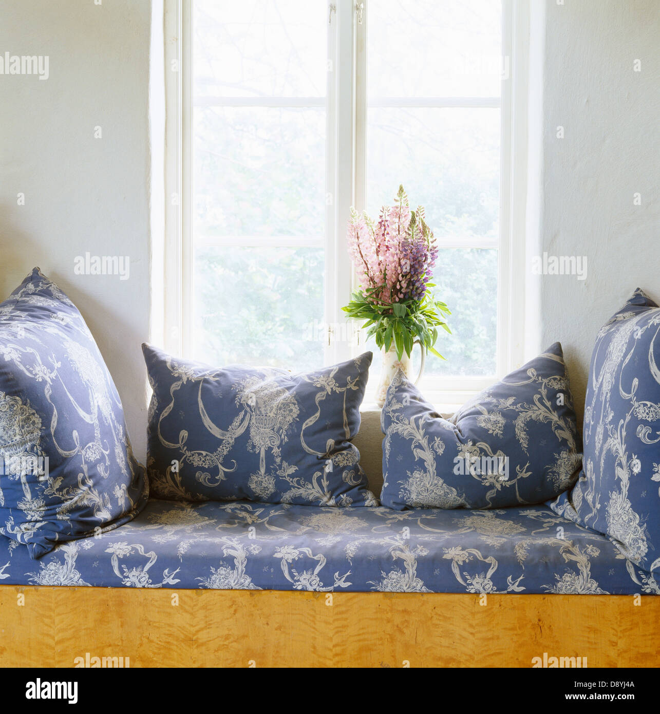 A sofa in front of a window Stock Photo Alamy