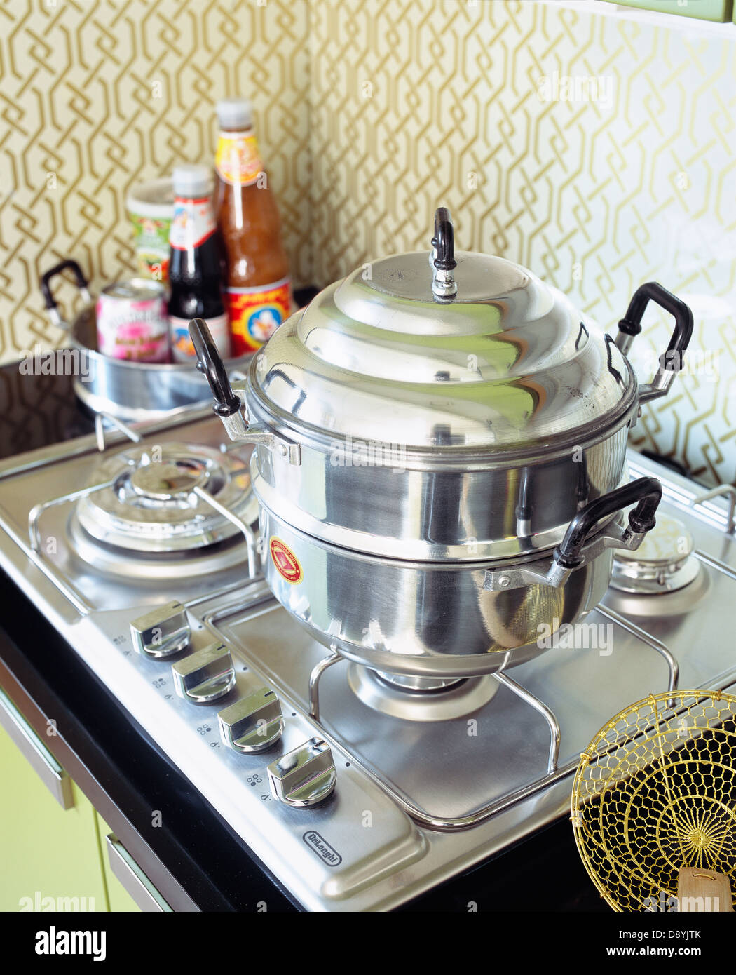A saucepan on a stove, Asian style Stock Photo Alamy