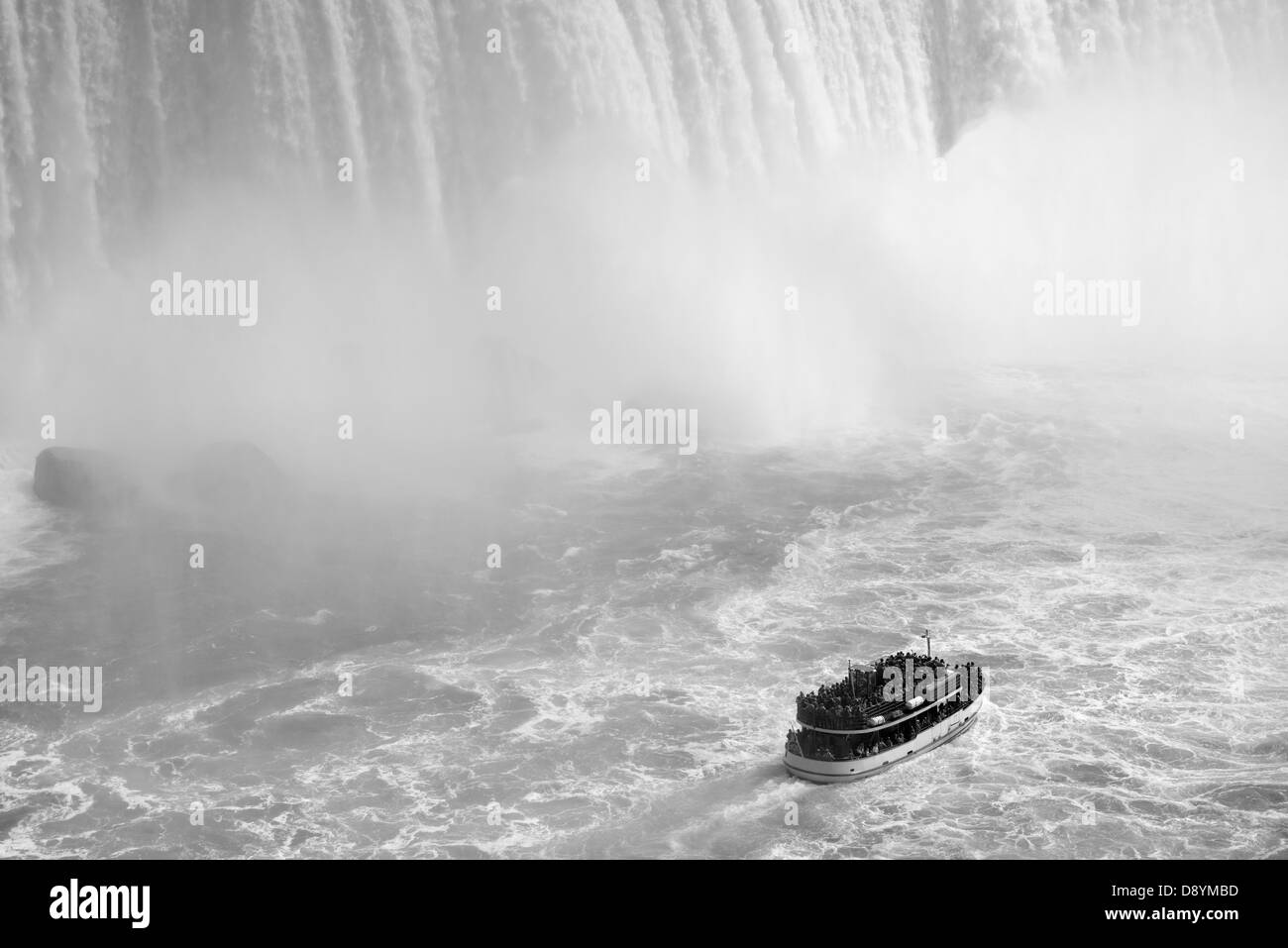 Boat and Horseshoe Falls from Niagara Falls in black and white Stock Photo