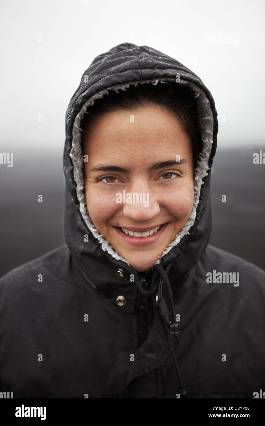 Portrait of woman smiling outdoors Stock Photo - Alamy