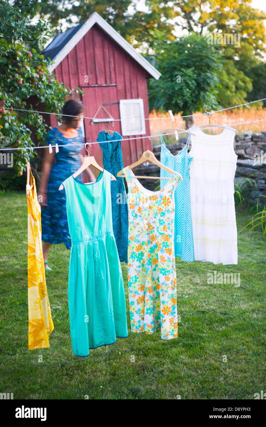Clothes line dress hires stock photography and images Alamy