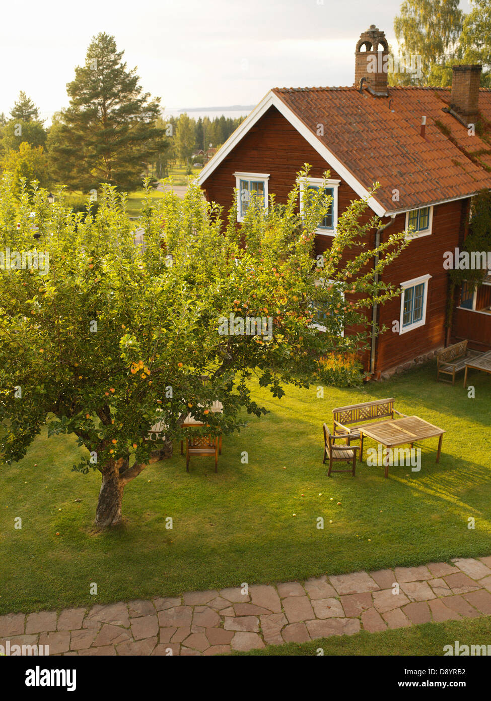 A red house with garden Stock Photo - Alamy