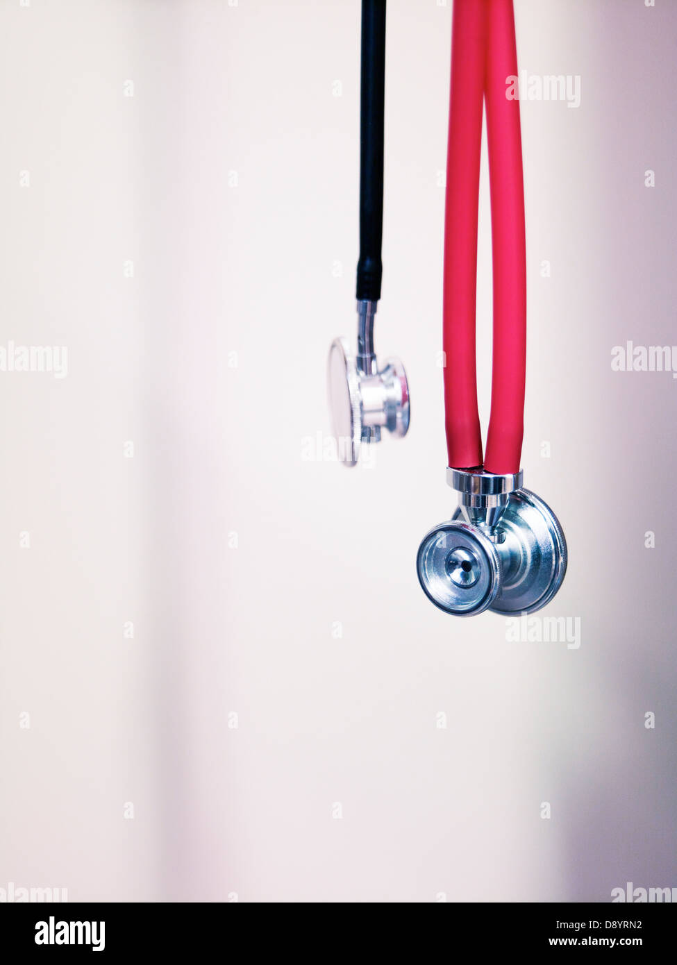 Red and black stethoscopes Stock Photo