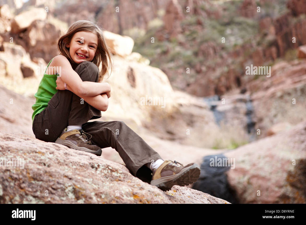Happy brunette girl sitting smiling hi-res stock photography and images ...