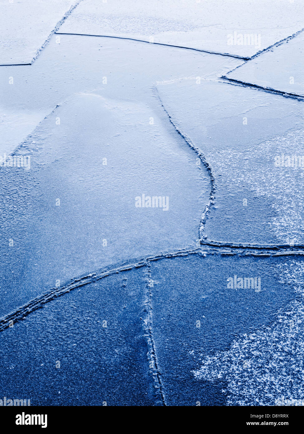 Close-up of cracked ice surface Stock Photo