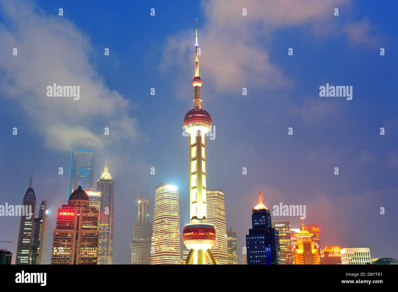 Shanghai city skyline at night over Huangpu river Stock Photo - Alamy