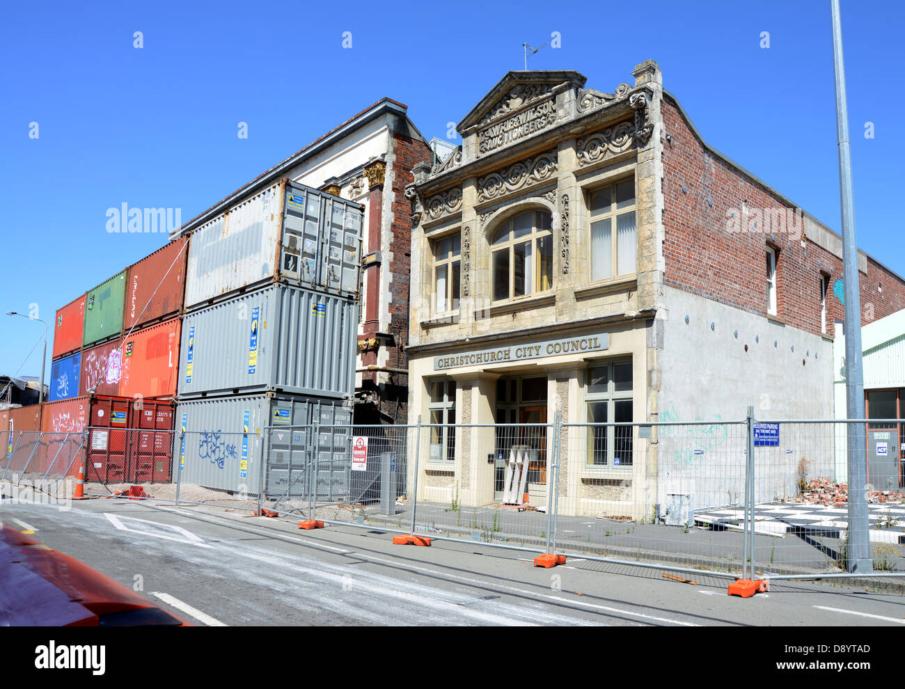 Stackable Container Homes Crumbling Crumbling buildings are supported by shipping containers in the ...
