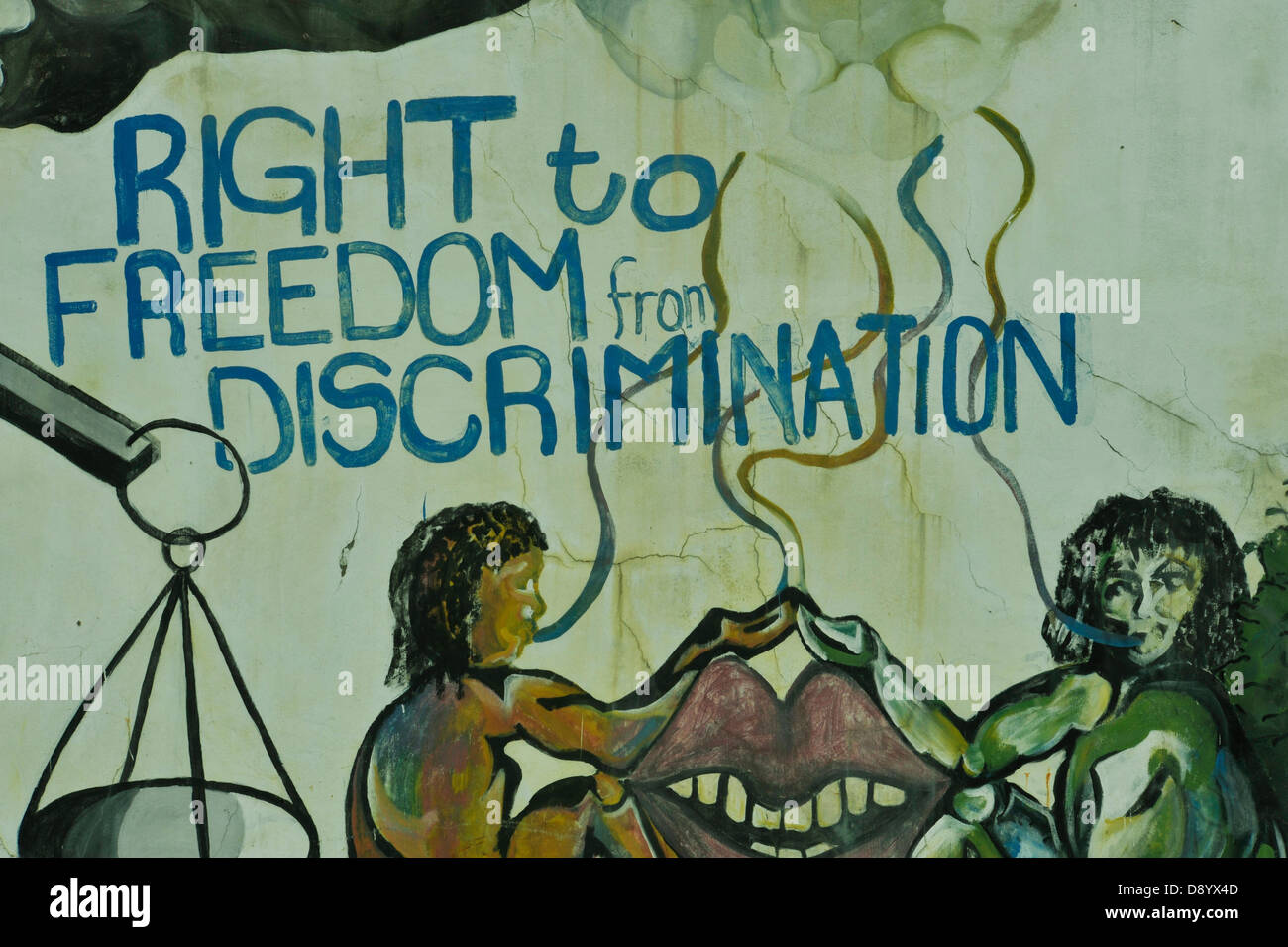 Freedom from Discrimination graphic of two people holding hands graffiti protesting against Apartheid Durban South Africa Stock Photo