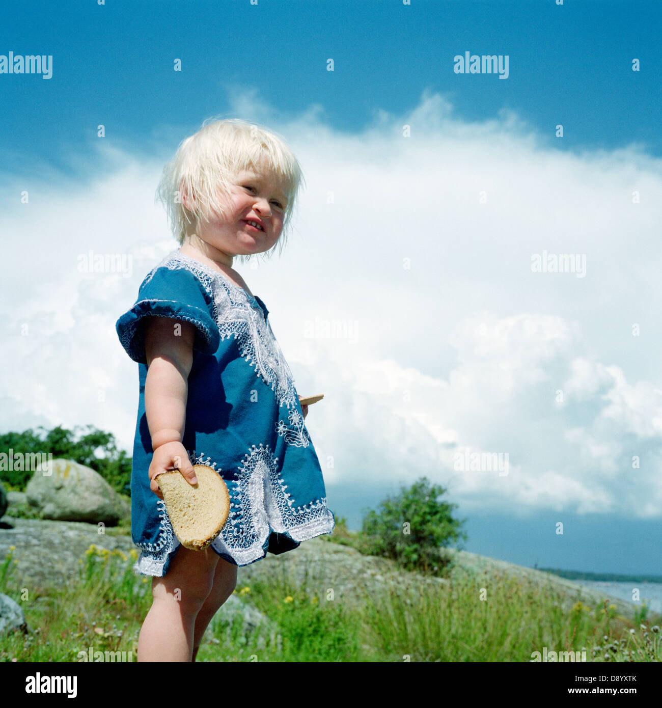 A little girl by the sea, Sweden Stock Photo - Alamy