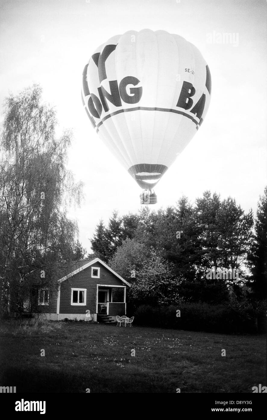 An air balloon above a cottage, Sweden. Stock Photo
