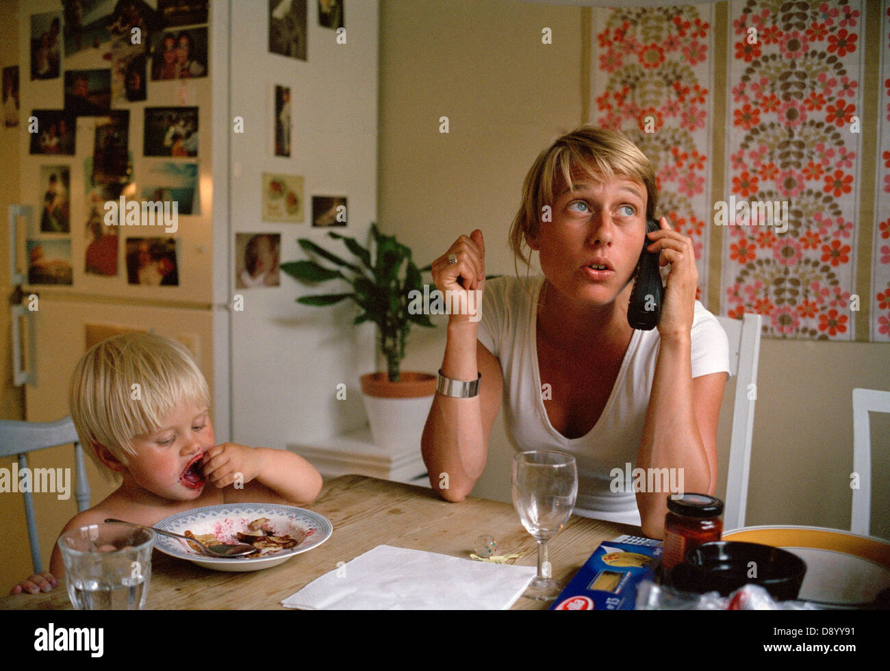 Mother and daughter in a kitchen, Sweden. Stock Photo