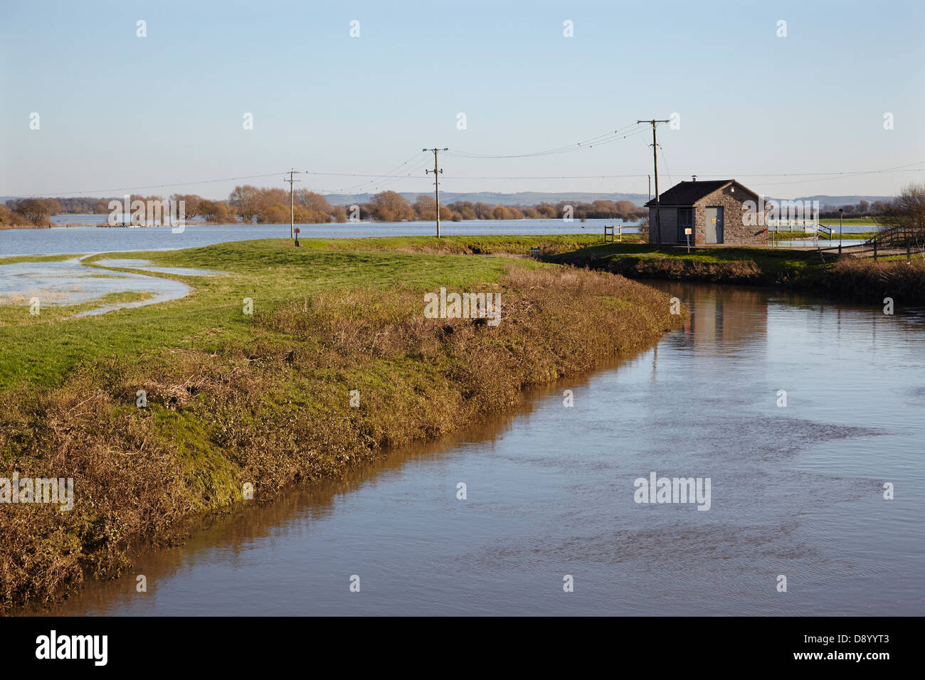 Flooding on farmland along the River Parrett after heavy winter rain, near Martock, in the Somerset Levels, Somerset, Great Britain. Stock Photo