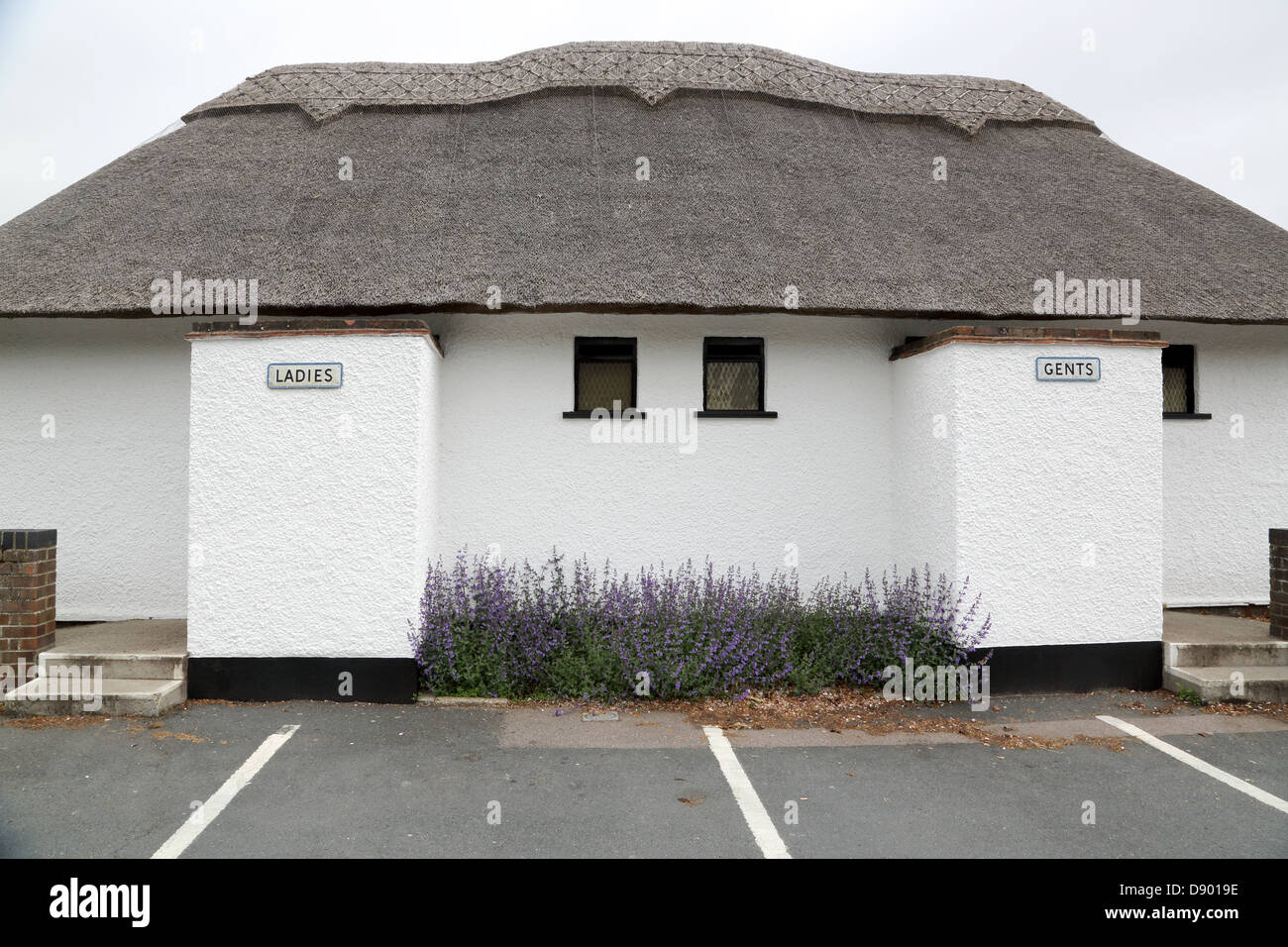 thatched public toilets at oulton broad in suffolk Stock Photo