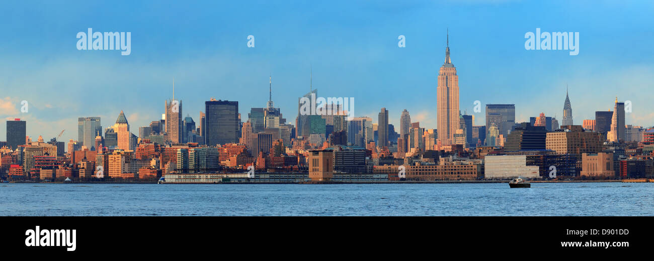 Downtown Manhattan skyline at sunset over Hudson River in New York City ...