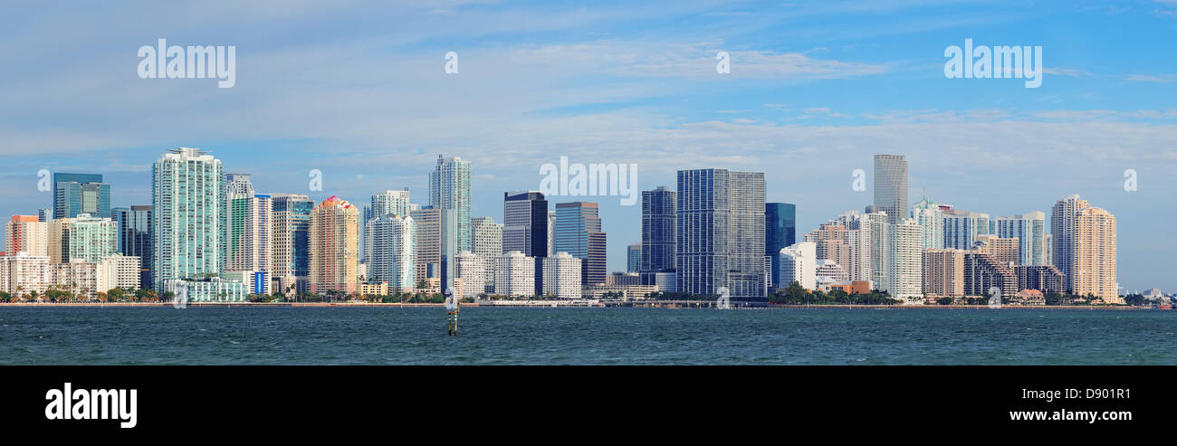 Miami skyline panorama in the day with urban skyscrapers and cloudy sky over sea Stock Photo