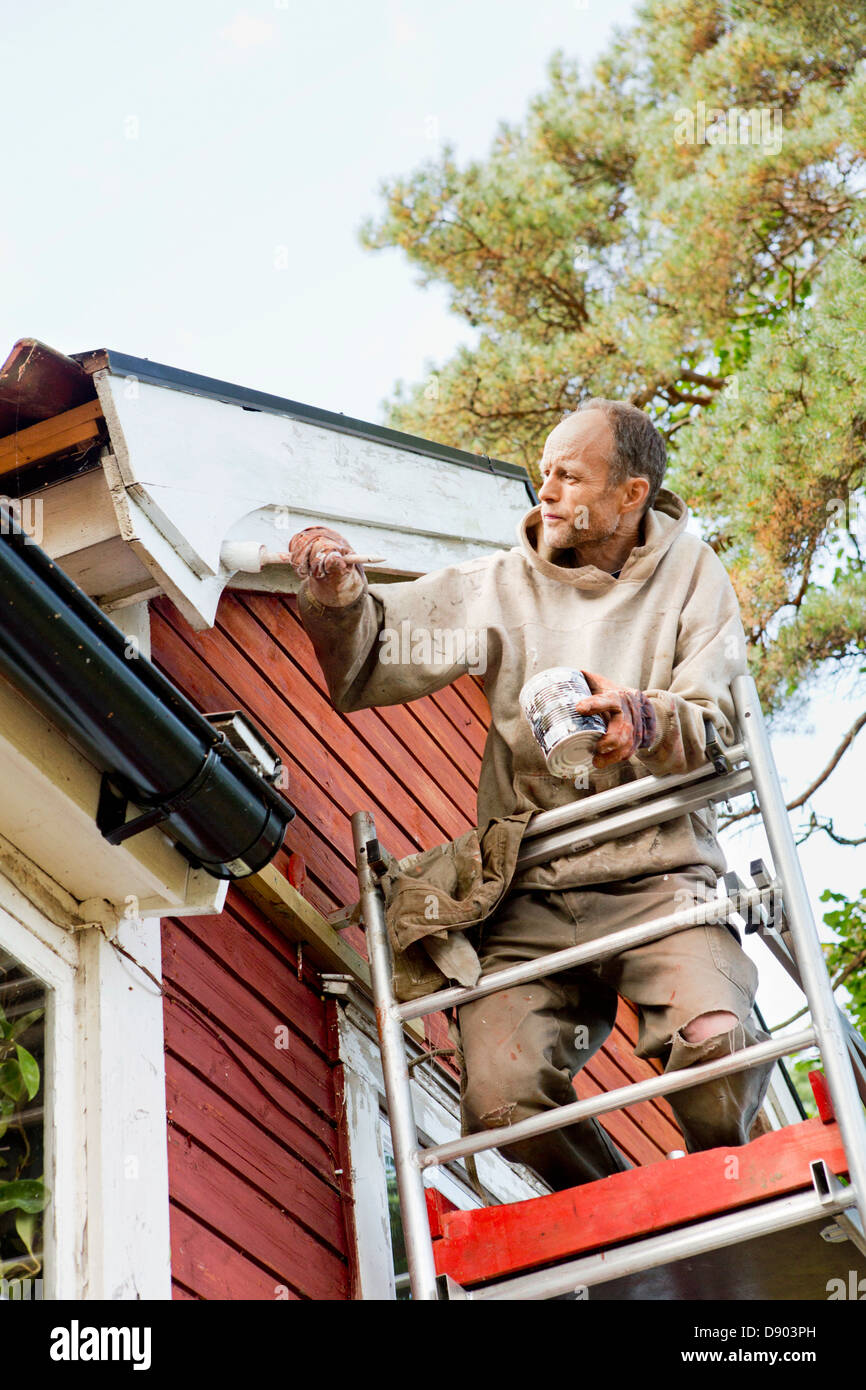 Painting on ladder hi-res stock photography and images - Alamy