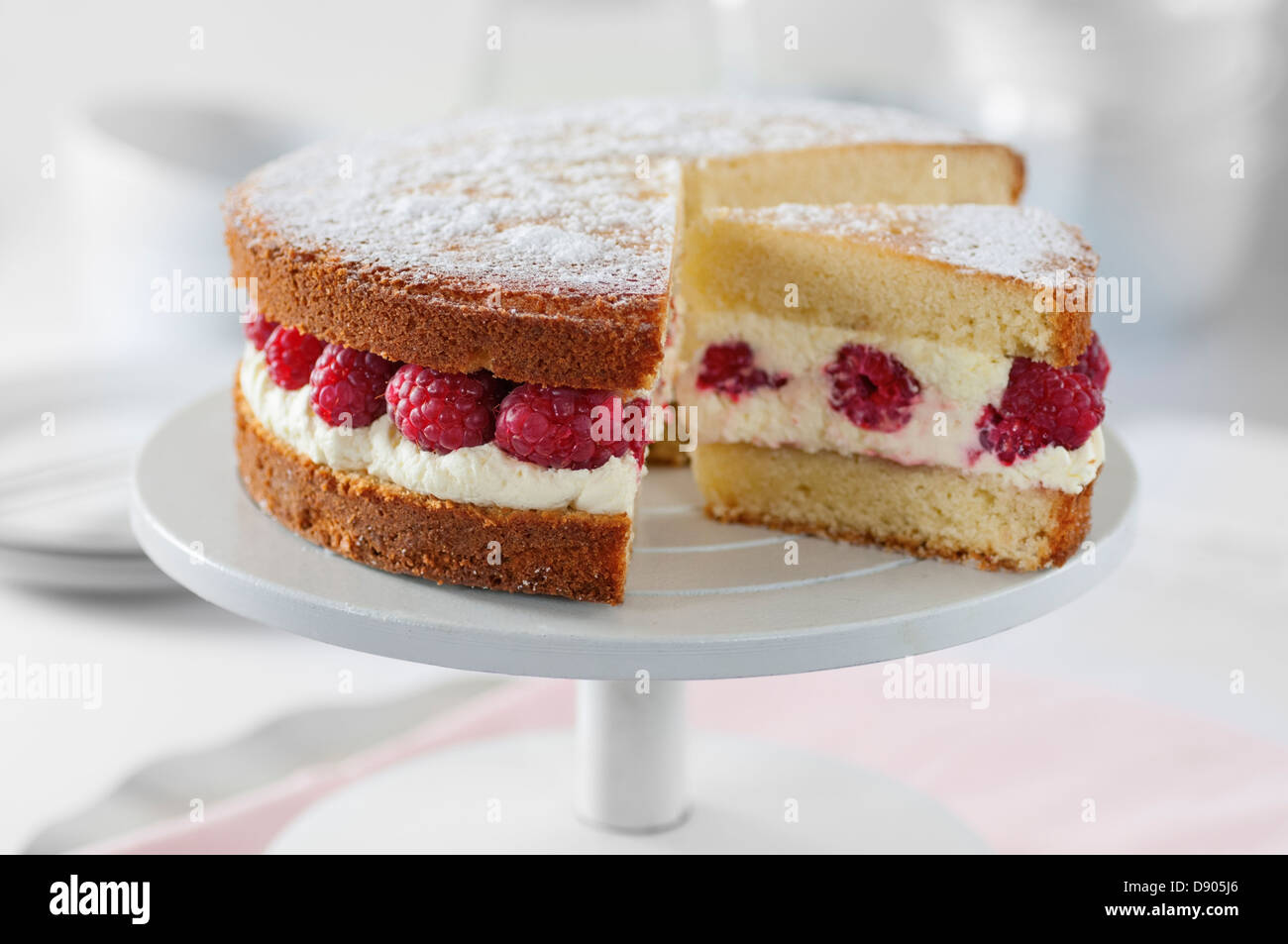 Victoria sponge cake with raspberries and cream Stock Photo