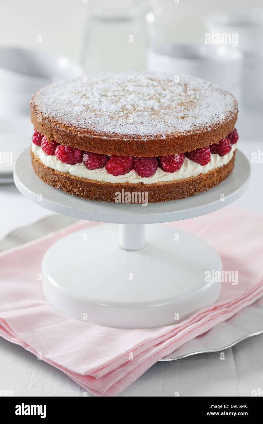 Victoria sponge cake with raspberries and cream Stock Photo Alamy