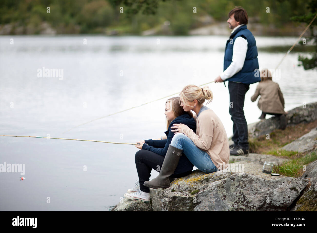 Two boys fishing lake hi-res stock photography and images - Alamy