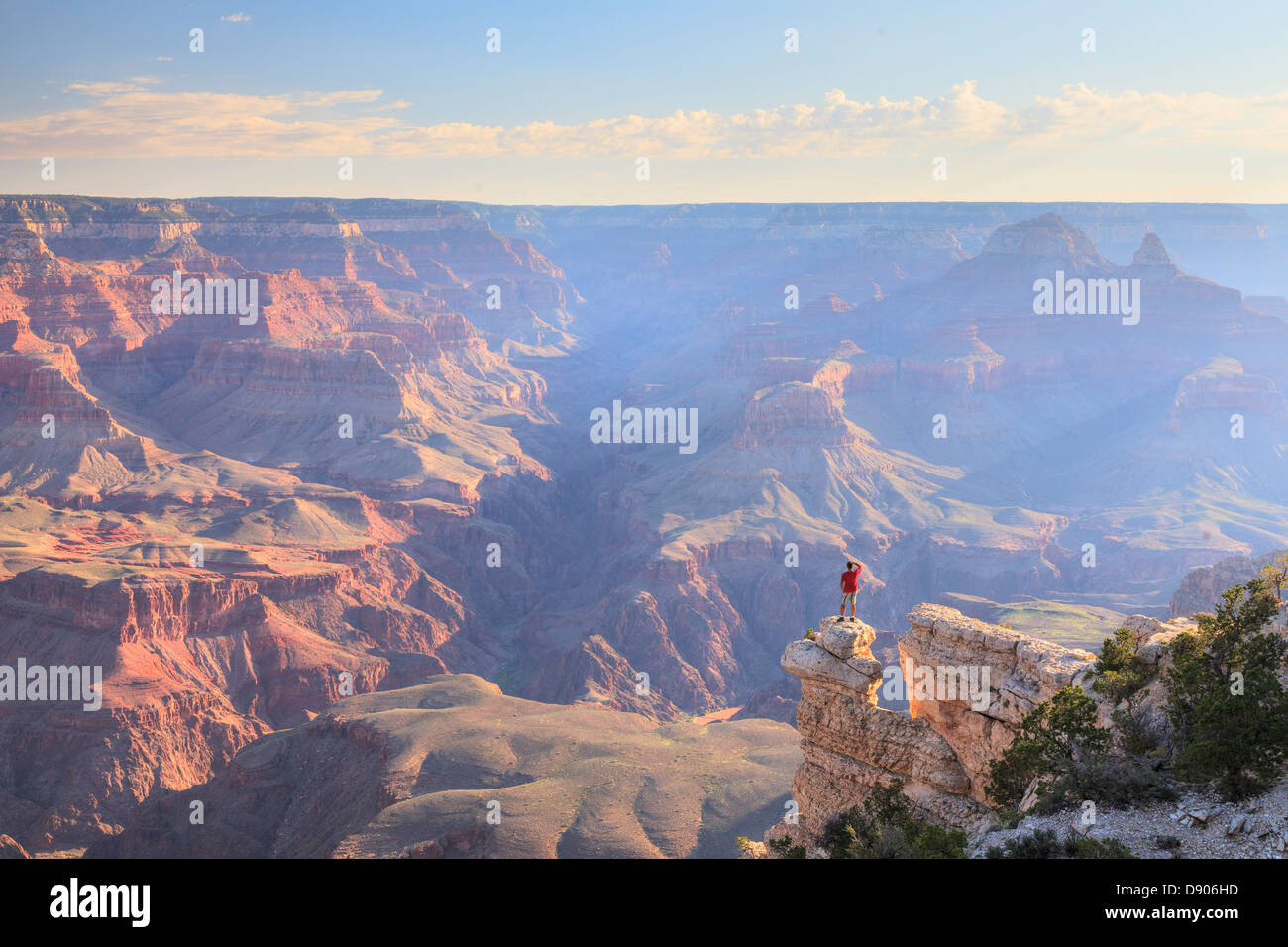 USA, Arizona, Grand Canyon National Park (South Rim), Yavapai Point, Hiker on Cliff Edge (MR) Stock Photo