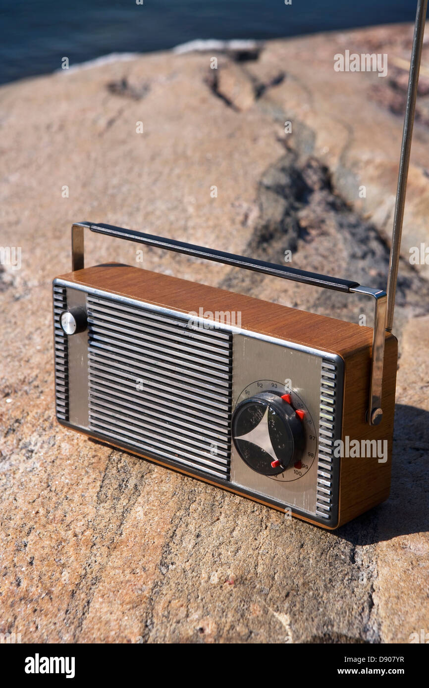 A radio on a flat piece of rock, Stockholm archipelago, Sweden. Stock Photo