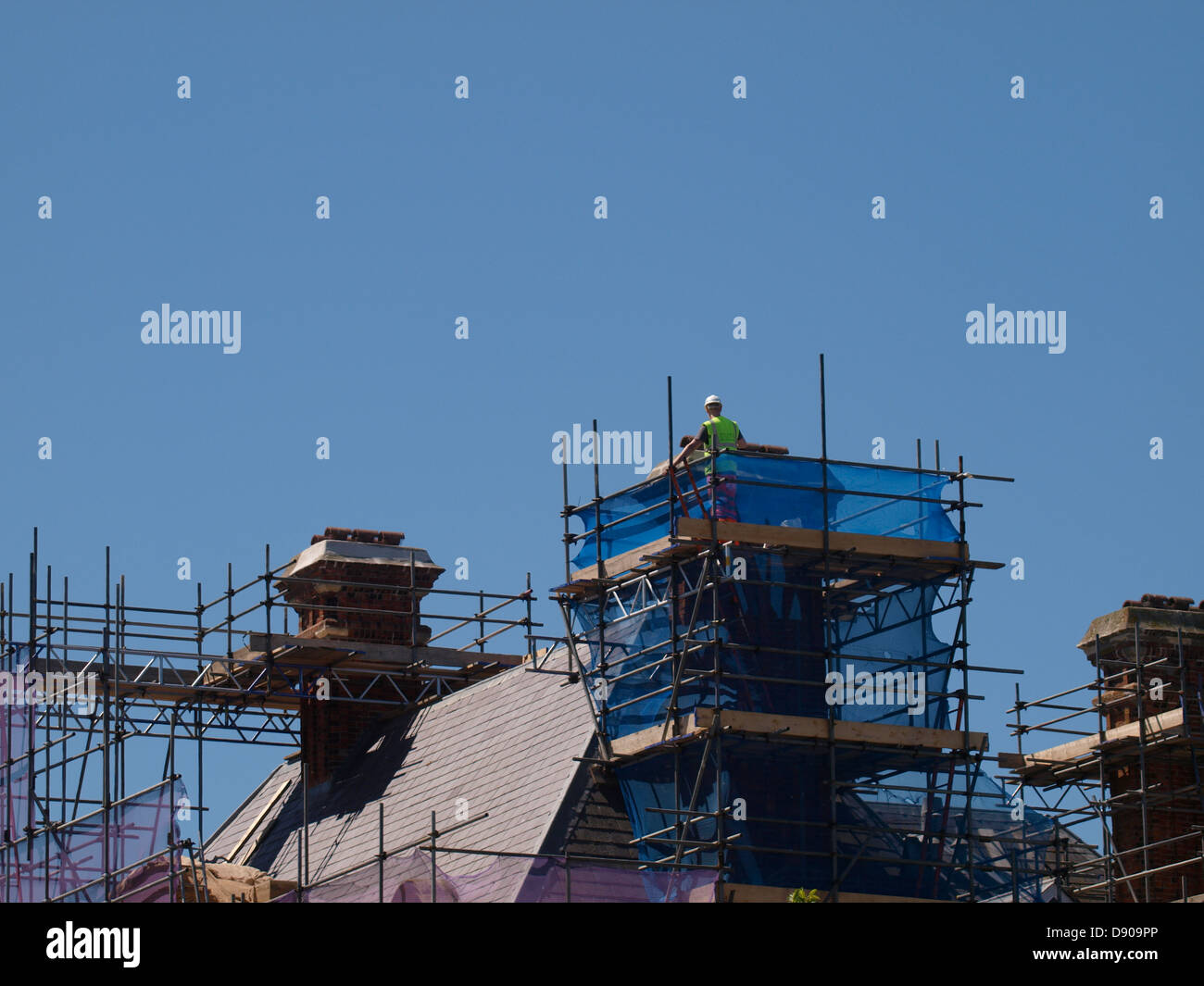 Scaffolding around chimneys, UK 2013 Stock Photo - Alamy