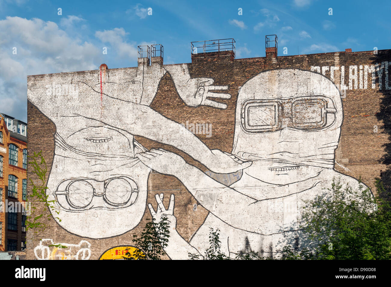 Brothers Wall Painting by artist Blu, Kreuzberg Street Art, Berlin, Germany Stock Photo