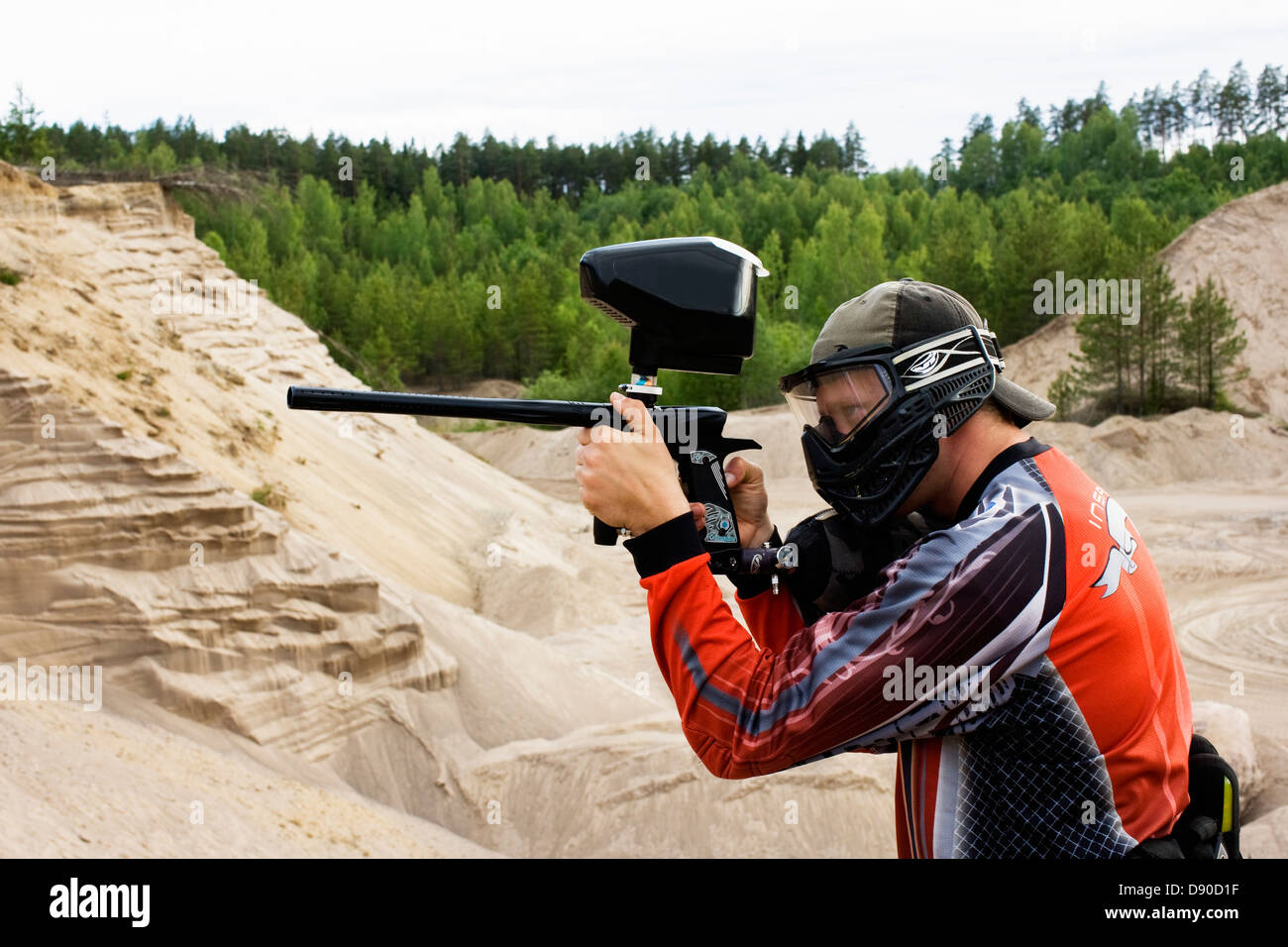 Men playing paintball, Sweden. Stock Photo