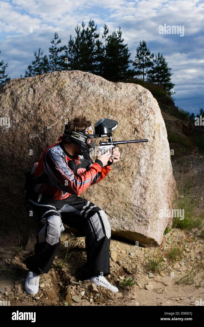 Men playing paintball, Sweden. Stock Photo