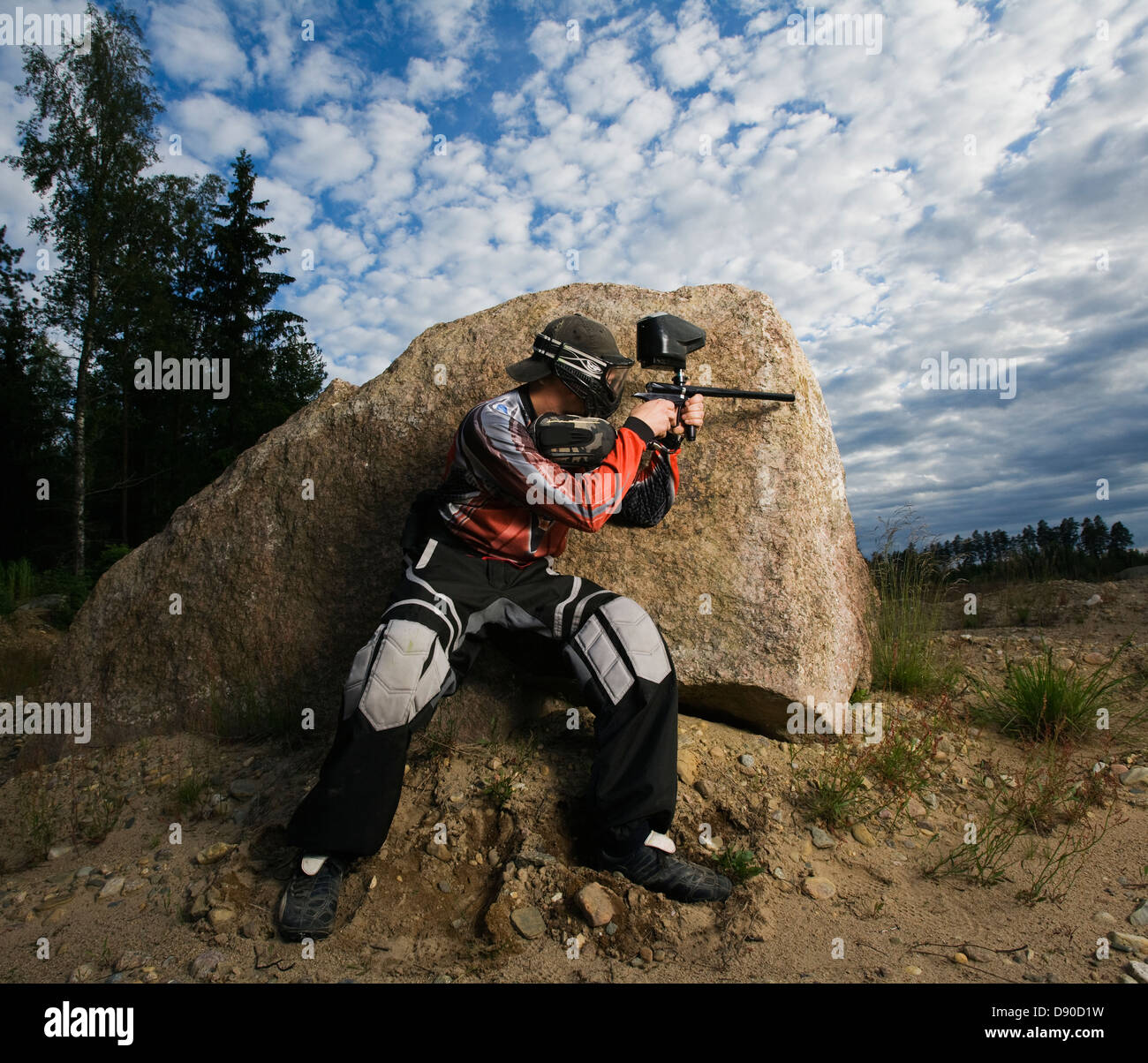 Men playing paintball, Sweden. Stock Photo