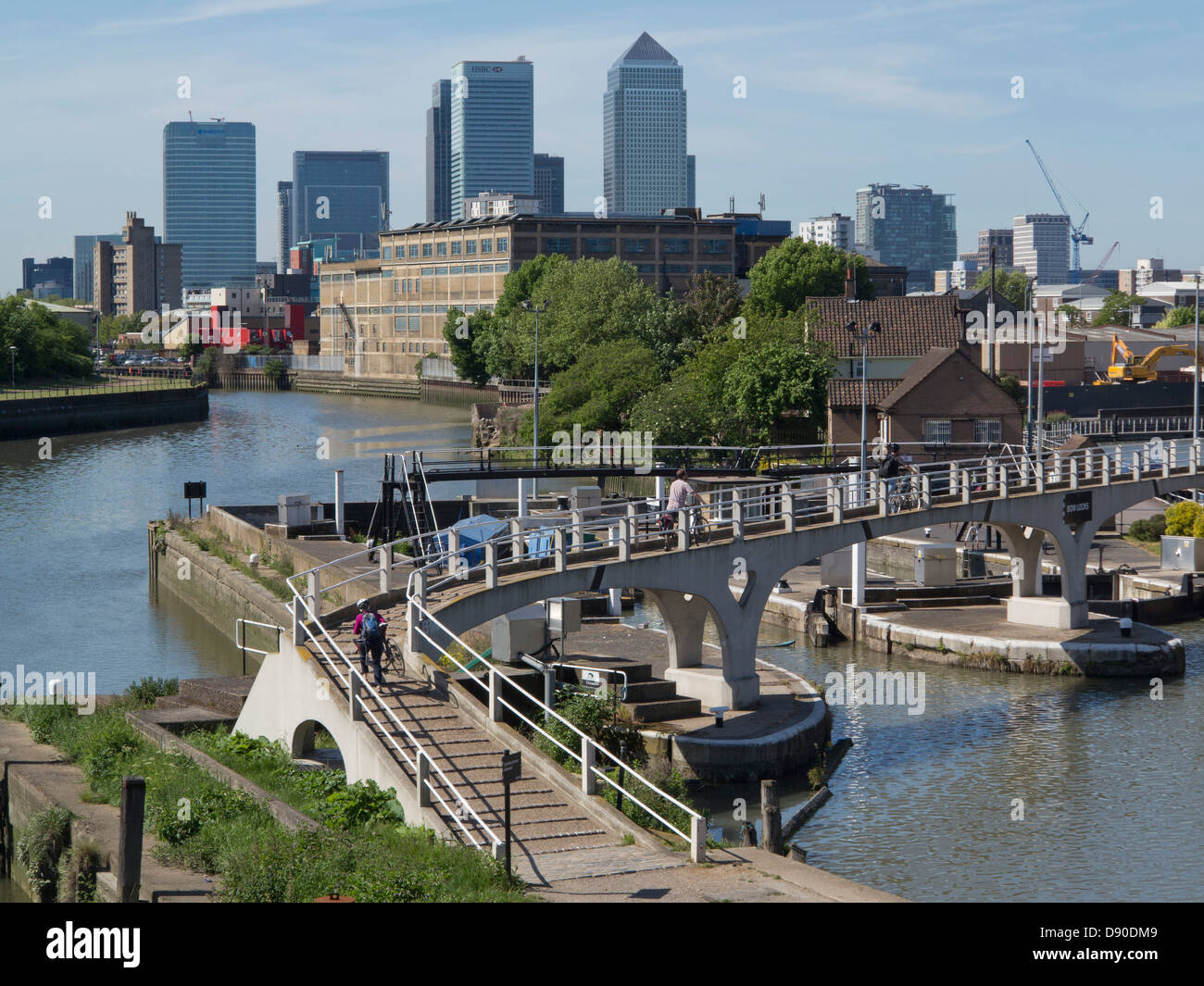 Views of river Lea and the Lea Valley walk with Canary Wharf in the background London, UK Stock Photo