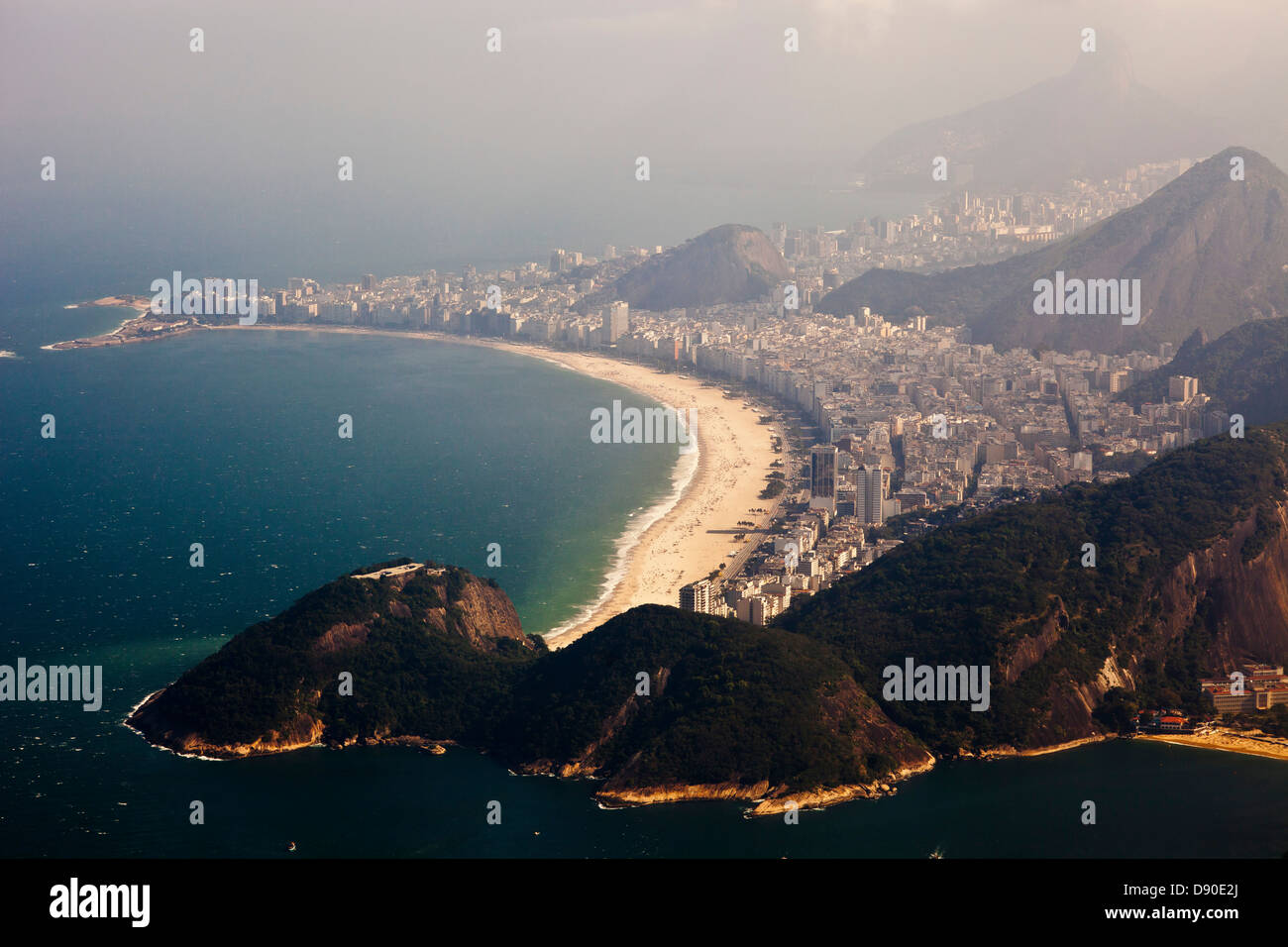 Aerial view of Copacabana beach and neighborhood on a misty morning - high level of humidity in the air. Rio de Janeiro, Brazil. Stock Photo