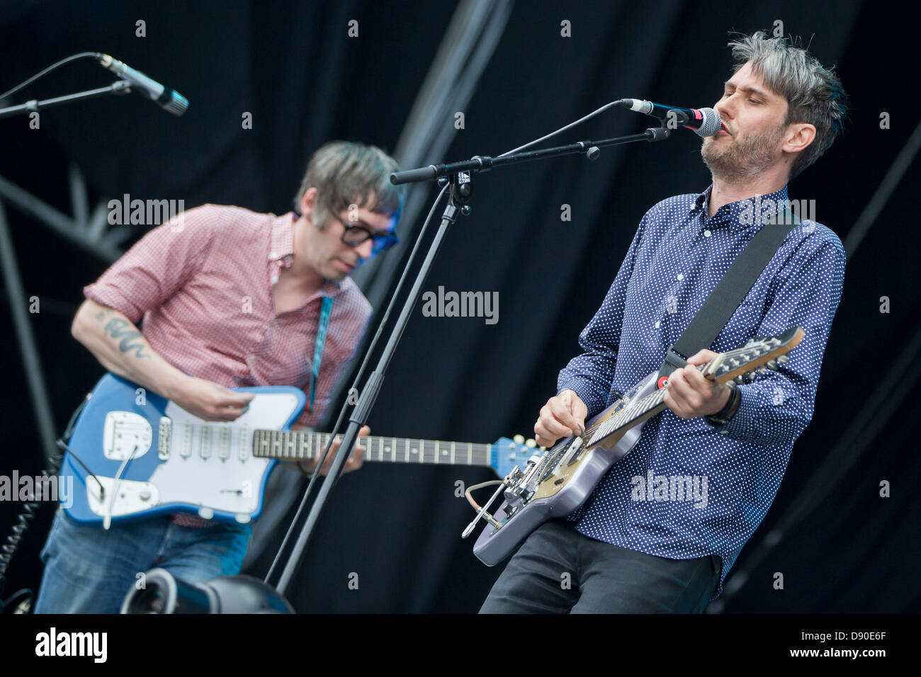 Nuremberg, Germany. 7th June 2013. Front man of German band Tocotronic, Dirk von Lowtzow, and guitarist Rick McPhail perform at the music festival 'Rock im Park' in Nuremberg, Germany, 07 June 2013. Over 70,000 rock musicians are expected to the festival which continues until 09 June. Photo: DANIEL KARMANN/dpa/Alamy Live News Stock Photo