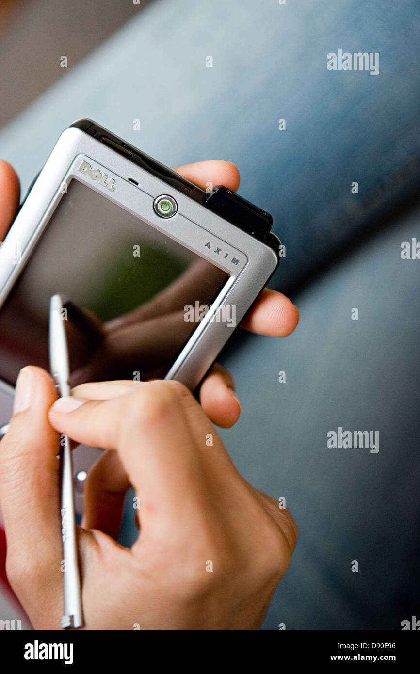 A handheld computer, close-up Stock Photo - Alamy