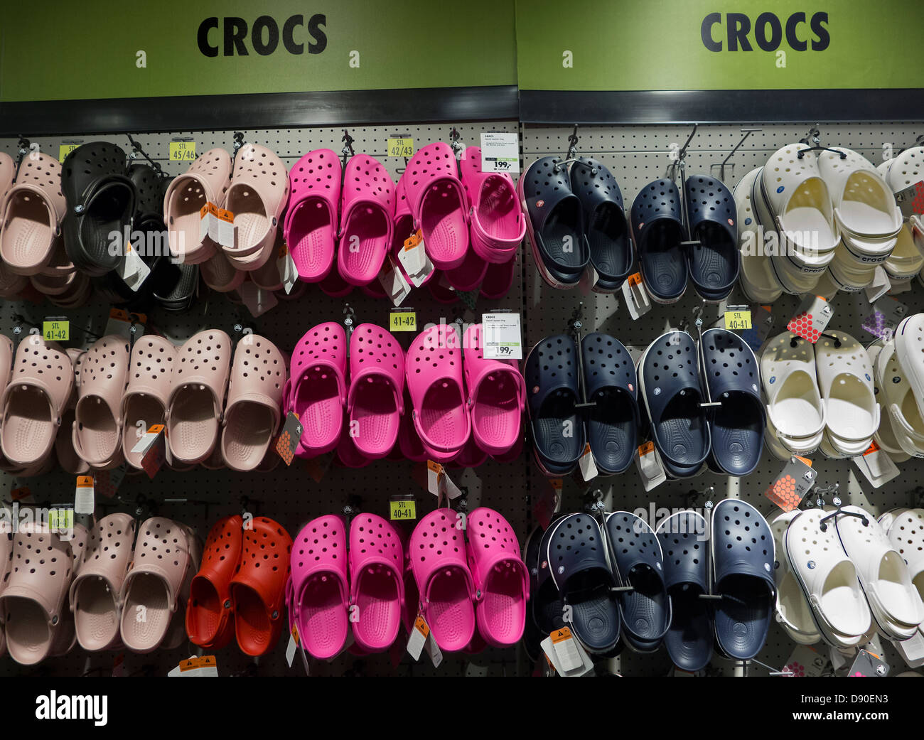 Crocs shoes on display stand in a 