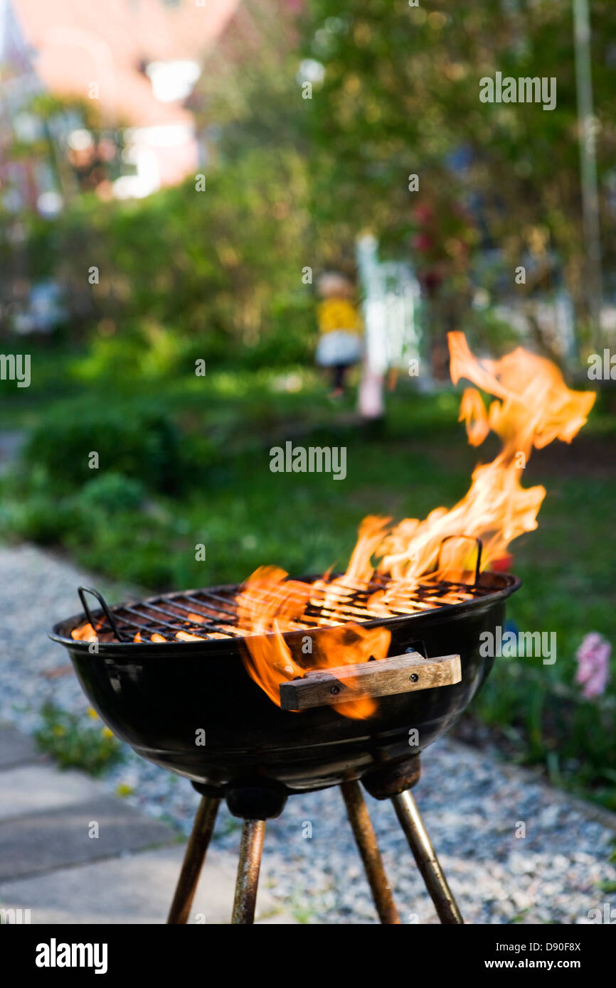 A grill on fire, Sweden Stock Photo Alamy