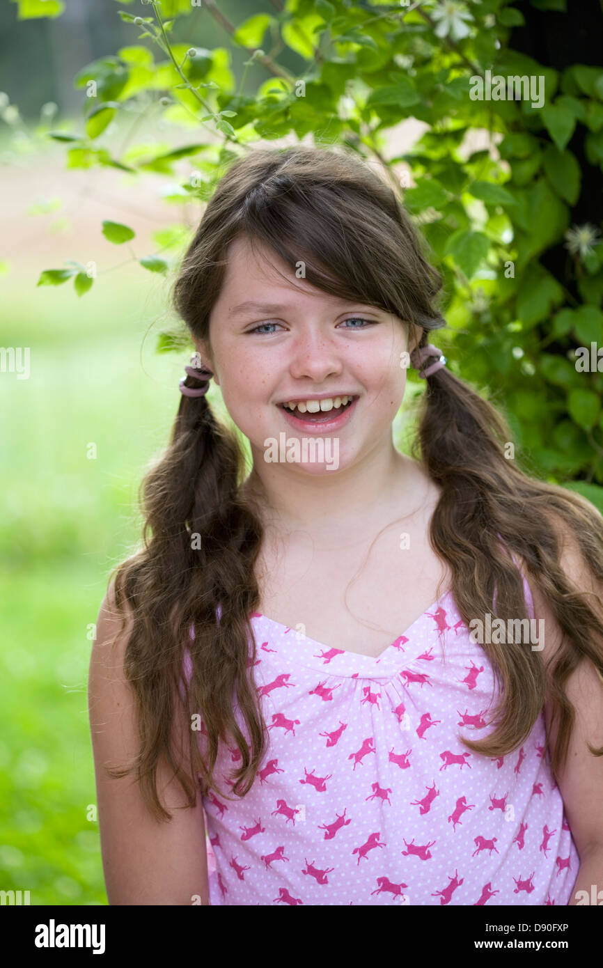 Portrait of girl smiling Stock Photo - Alamy