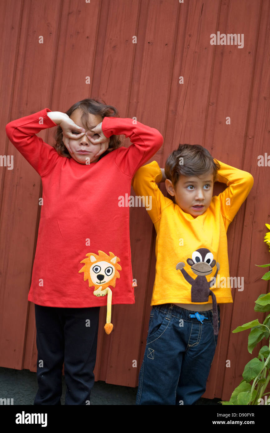 Boy messing outdoors hi-res stock photography and images - Alamy