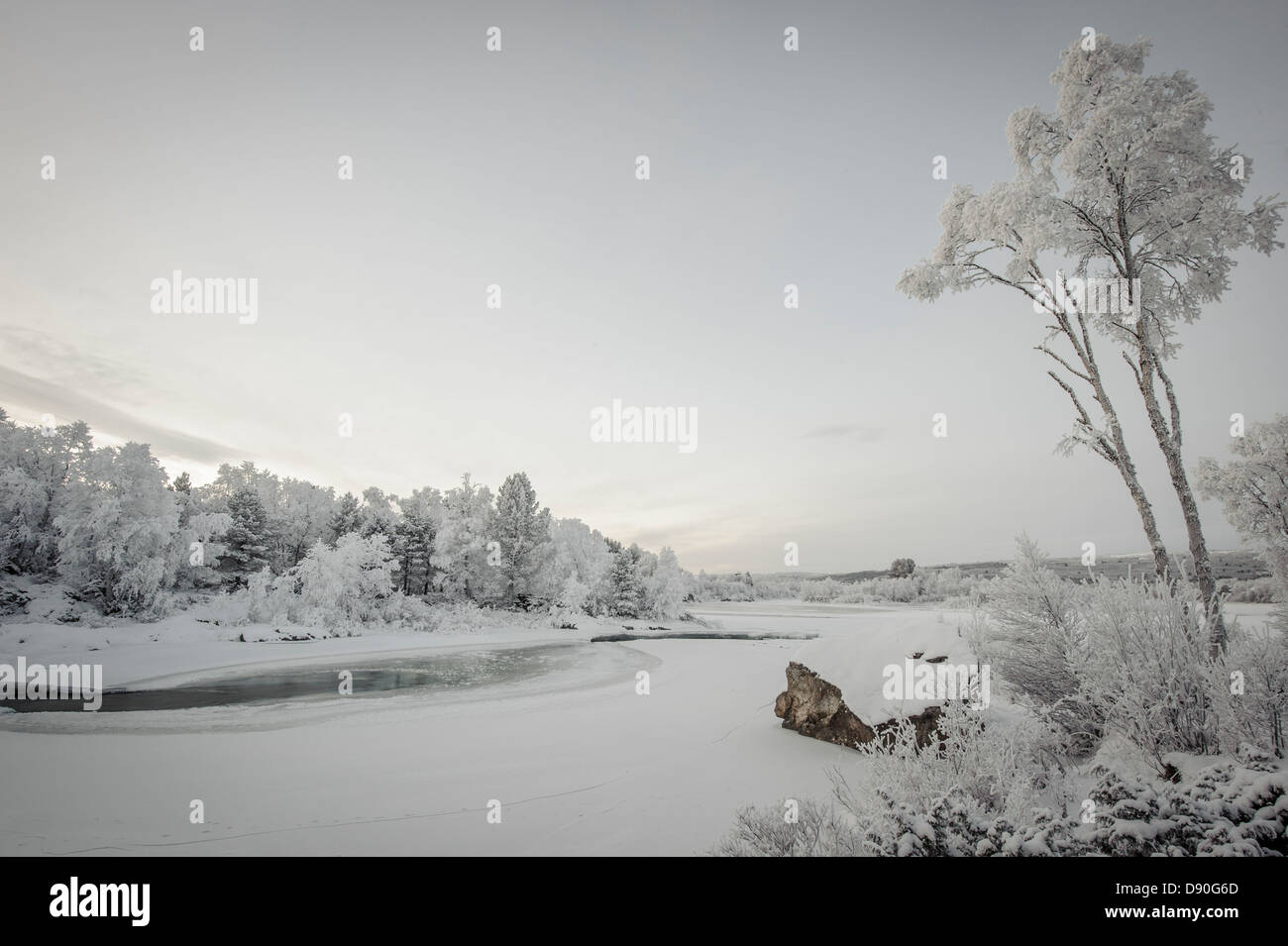 Scenic view of Glomma river at dawn in winter. Stock Photo