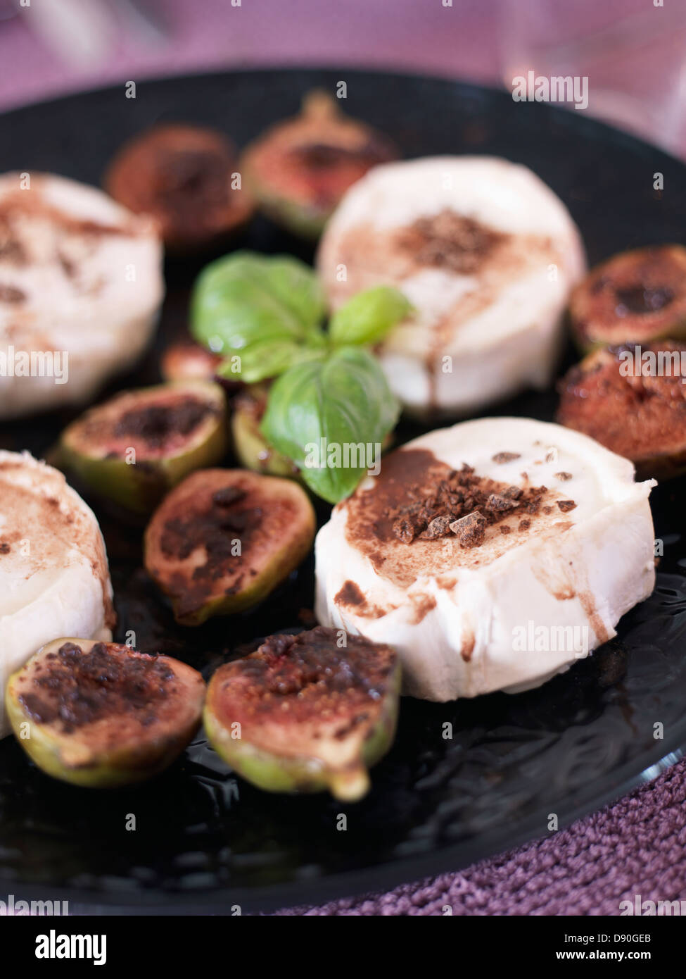 Figs and cheese served as appetisers Stock Photo