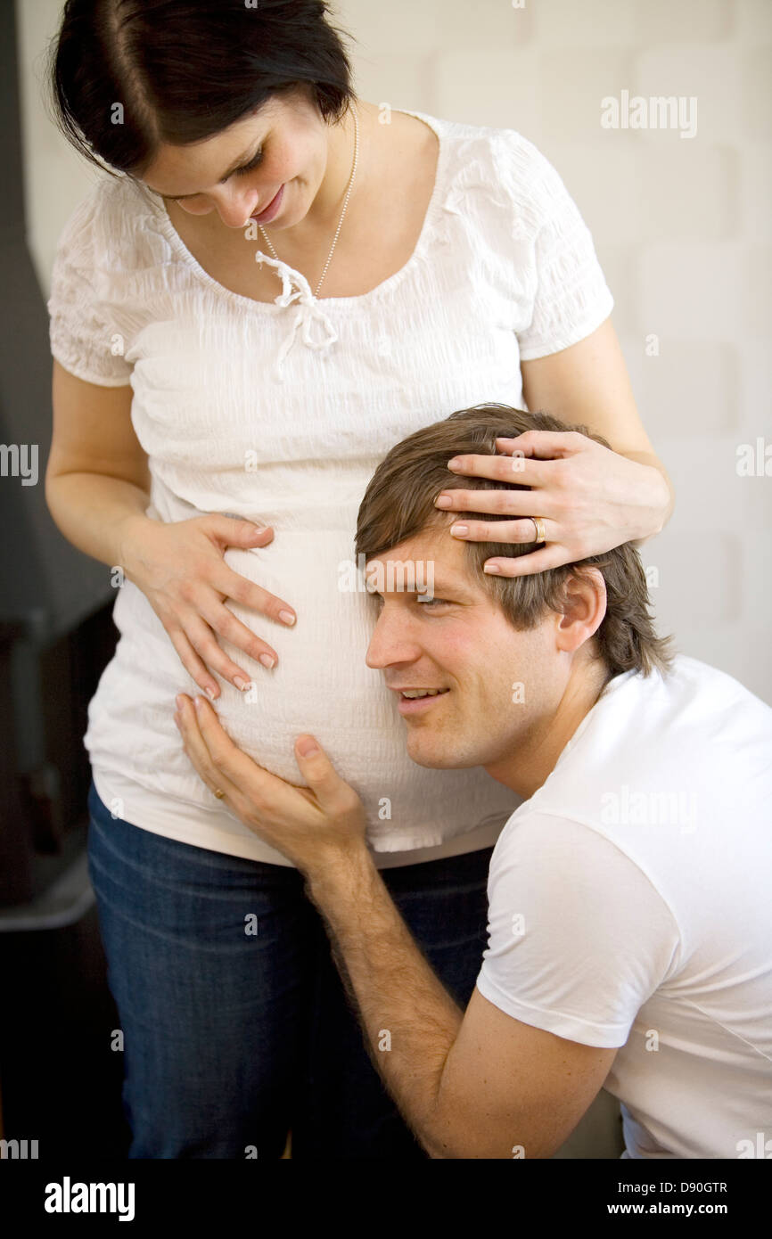A man and a pregnant woman, Sweden Stock Photo - Alamy