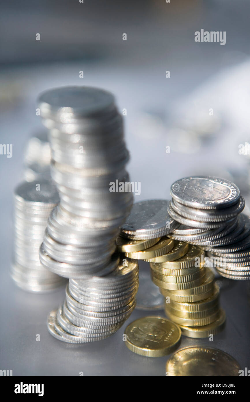 Pile coins hi-res stock photography and images - Alamy
