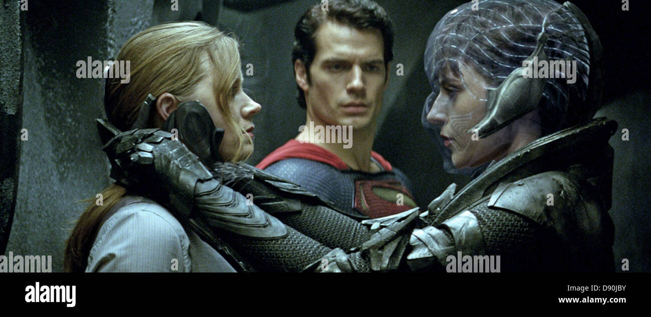 MAN OF STEEL 2013 Warner Bros film.  Henry Cavill as Clark Kent and Amy Adams at left as Lois Lane and Antje Traue as Faora-Ul Stock Photo